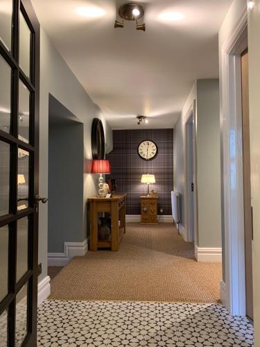 A bed or beds in a room at Crawfield Grange 