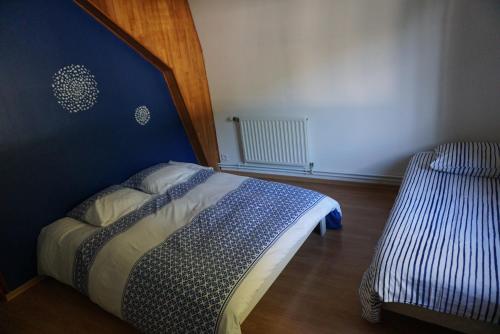 Postel nebo postele na pokoji v ubytování Chez Joséphine et Pierre