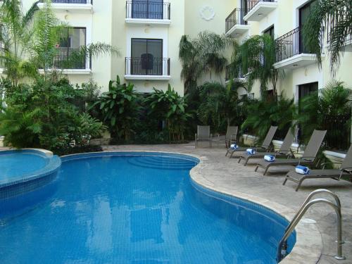 Bazén v ubytování Gran Real Yucatan nebo v jeho okolí