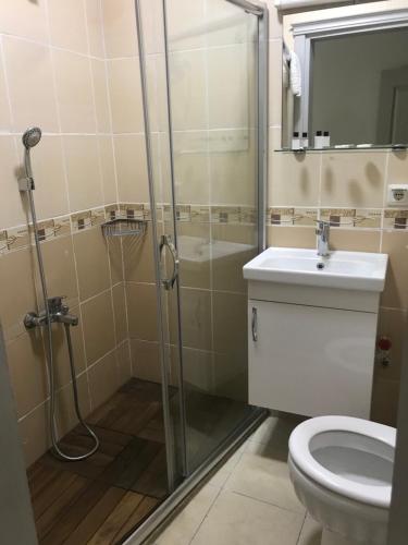 Koupelna v ubytování Meddusa Hotel