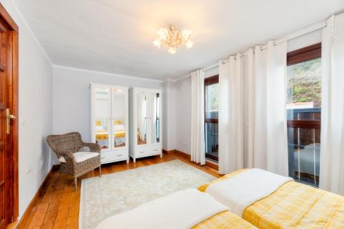 Postel nebo postele na pokoji v ubytování Villa Montaña Colorada