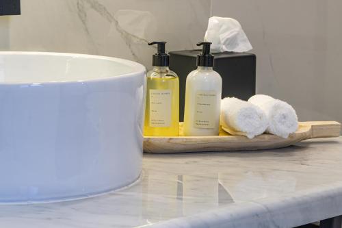 
a kitchen counter with a white towel on top of it at Agata Hotel Boutique & Spa in Mexico City
