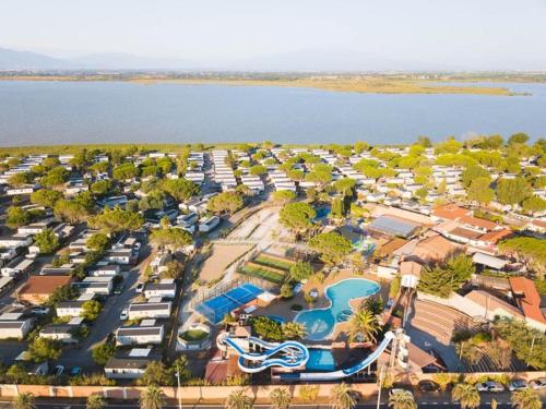 an aerial view of a pool at a resort at Bungalow in Canet-en-Roussillon
