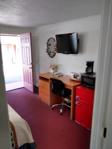 Kuchyň nebo kuchyňský kout v ubytování Holiday Motel Bend