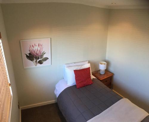 Katil atau katil-katil dalam bilik di Kauri Motel on Riccarton