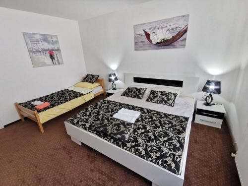 Katil atau katil-katil dalam bilik di Apartmani Marko
