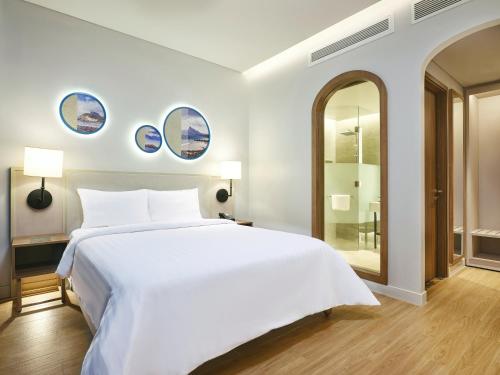 Katil atau katil-katil dalam bilik di Mercure Vung Tau Resort
