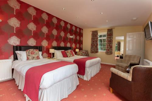 Burn How Garden Hotel - Bowness on Windermereにあるベッド