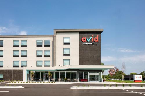 an office building with an amazon sign on it at Avid Hotels - Roseville - Minneapolis North by IHG in Roseville