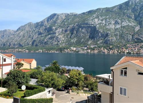 a view of a body of water with a mountain at Hotel Galia in Kotor