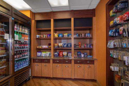 a grocery store aisle with shelves of food at La Quinta by Wyndham Denver Southwest Lakewood in Lakewood