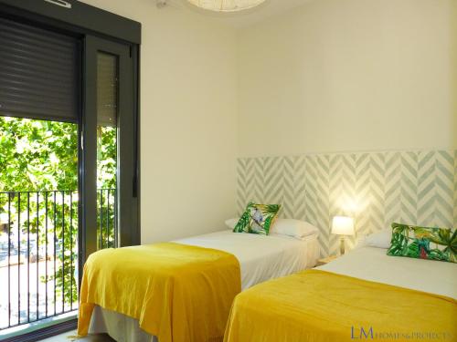Posteľ alebo postele v izbe v ubytovaní ALAMEDA SQUARE APARTMENT