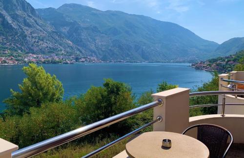 a balcony with a view of a lake at Hotel Galia in Kotor