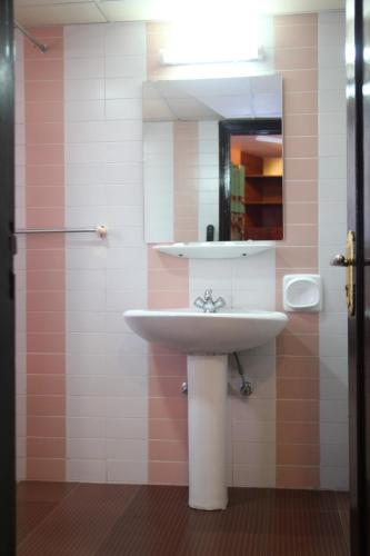 Koupelna v ubytování Downtown Hotel