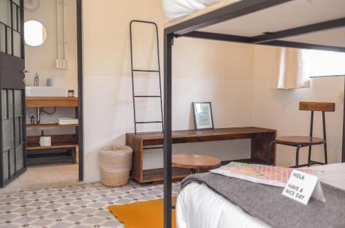 A bunk bed or bunk beds in a room at Izta Hostels