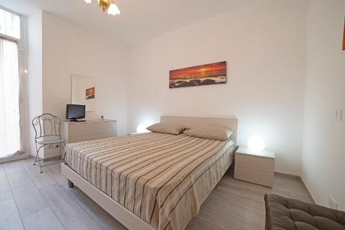 Posteľ alebo postele v izbe v ubytovaní Casa Donna Lidia