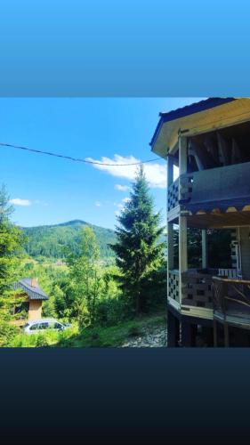 a building with a view of a mountain at RIVIERA in Lekechi