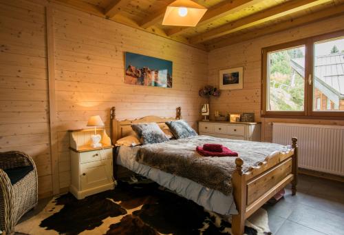 Ένα ή περισσότερα κρεβάτια σε δωμάτιο στο Chalet Domino