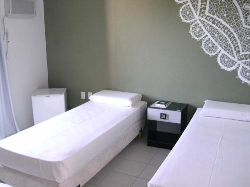 Кровать или кровати в номере Hotel Belas Artes