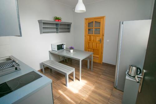 Kuchyň nebo kuchyňský kout v ubytování Willa Nad Potokiem