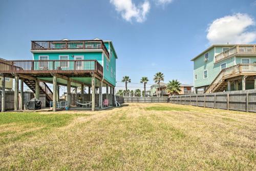 a house with a fence next to a yard at half Mi to Sand Surfside Beach Retreat! in Surfside Beach