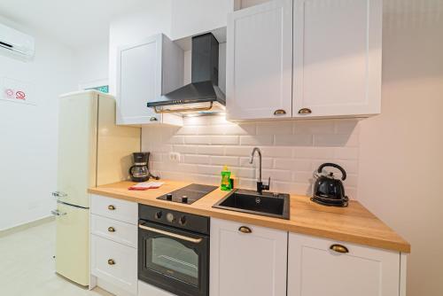 Dapur atau dapur kecil di Apartman Lena Centar