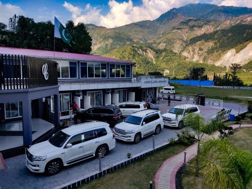 a group of cars parked in front of a building at Cordillera Resort in Hassa