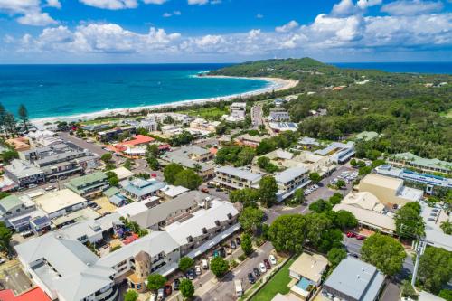 an aerial view of a city and the ocean at Byron Bay Hotel and Apartments in Byron Bay