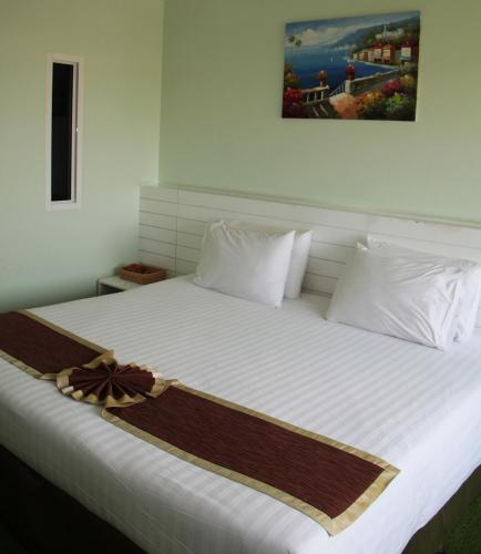 V Verve Service Apartment Hotelにあるベッド