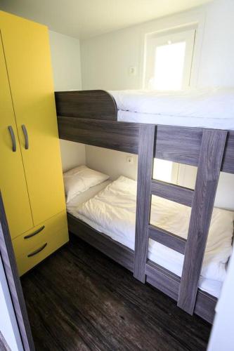 a couple of bunk beds in a room at Floating House Sea Queen in Portorož