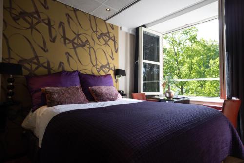 Ein Bett oder Betten in einem Zimmer der Unterkunft Hotel Sebastians