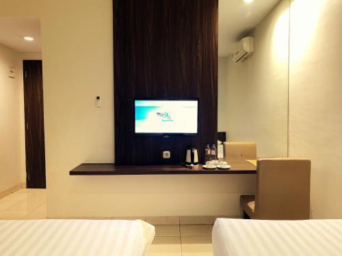 Postel nebo postele na pokoji v ubytování Ameera Hotel