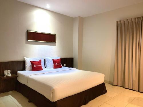 Postel nebo postele na pokoji v ubytování Ameera Hotel