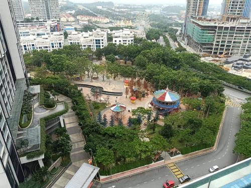an aerial view of a park in the middle of a city at D'Gunduls Homestay STUDIO by DGH I-CITY in Shah Alam