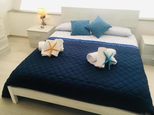 A bed or beds in a room at Casa Caterina Deluxe Sorrento Coast