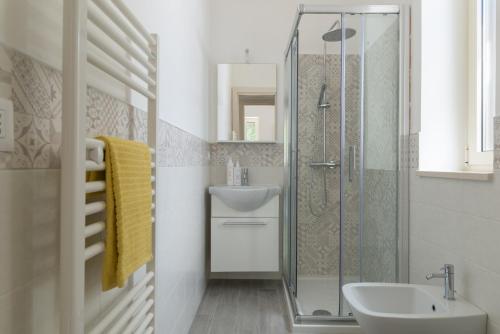 a bathroom with a shower and a sink at Villetta Silvana by Wonderful Italy in Ostuni