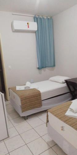 Cama o camas de una habitación en Center 1 Hotel