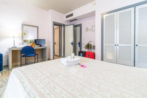 Katil atau katil-katil dalam bilik di Hotel Abades Manzanil