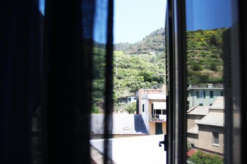 a view of a city from a window at Da Baranin in Manarola
