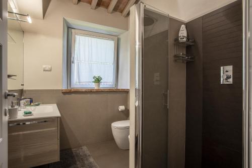 Koupelna v ubytování Residenza al Poggio degli Ulivi