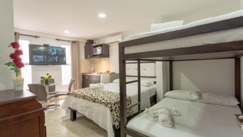 Ένα ή περισσότερα κρεβάτια σε δωμάτιο στο Hollywood Beach Suite