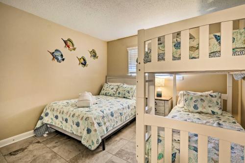 a bedroom with a bunk bed and a bunk bed at Walk to Beach Nautical Hilton Head Resort Condo! in Hilton Head Island