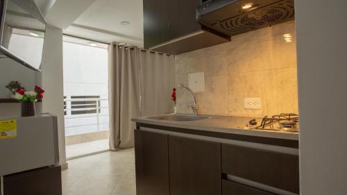Kuchyň nebo kuchyňský kout v ubytování Hollywood Beach Suite