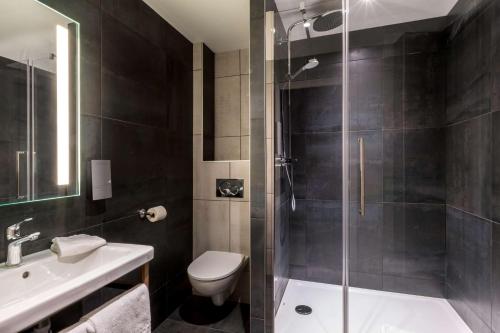 Ванная комната в Hôtel du Nord, Sure Hotel Collection by Best Western