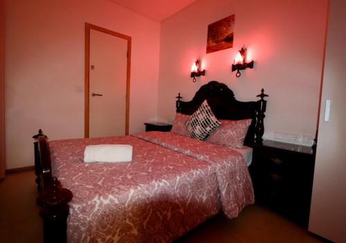 Postel nebo postele na pokoji v ubytování Welcome Guest House