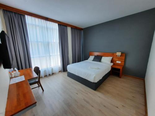 Postel nebo postele na pokoji v ubytování Hotin Inn