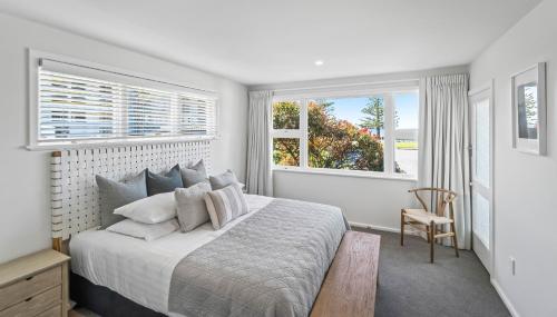 Postel nebo postele na pokoji v ubytování Kaikoura Beach Motel