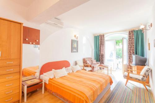 Postel nebo postele na pokoji v ubytování Green garden Rooms & Apartments