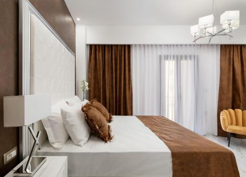 A bed or beds in a room at Castello Luxury Residence with Private Jacuzzi