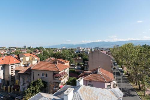 a view of a city with houses and buildings at Noviz Hotel in Plovdiv